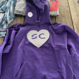 Woman’s Stonehill College hoodie brand new never been worn